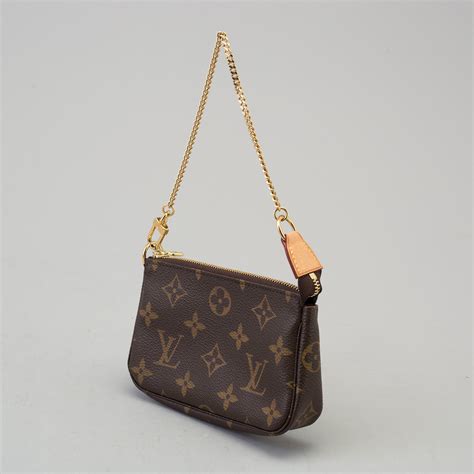 louis vuitton small satchel.